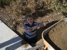 IMG_2049 This is my son Wyatt (MUCH BIGGER NOW) who was helping me dig a hole for a megawreath support foundation.