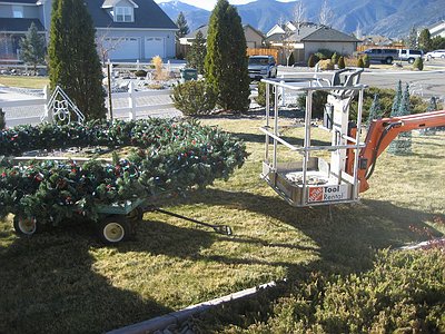 Tieing wreath to lift