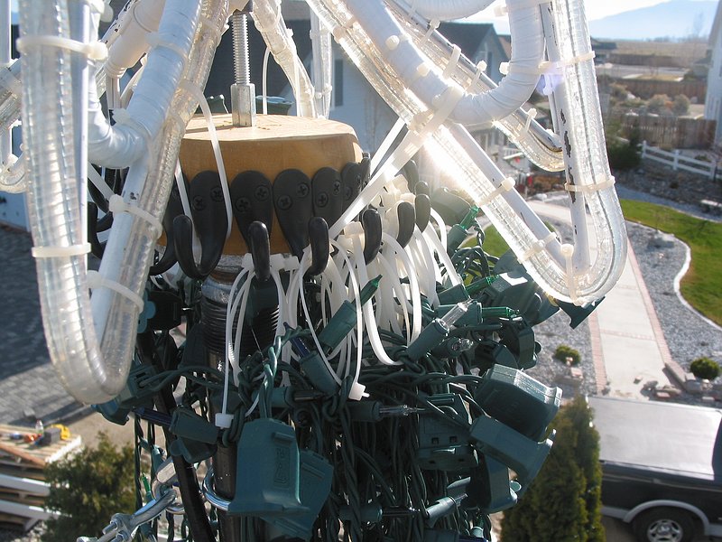 Closeup of zipties on strings to bunfoot hooks